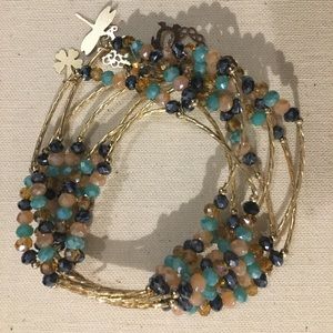 7 bracelets with charms